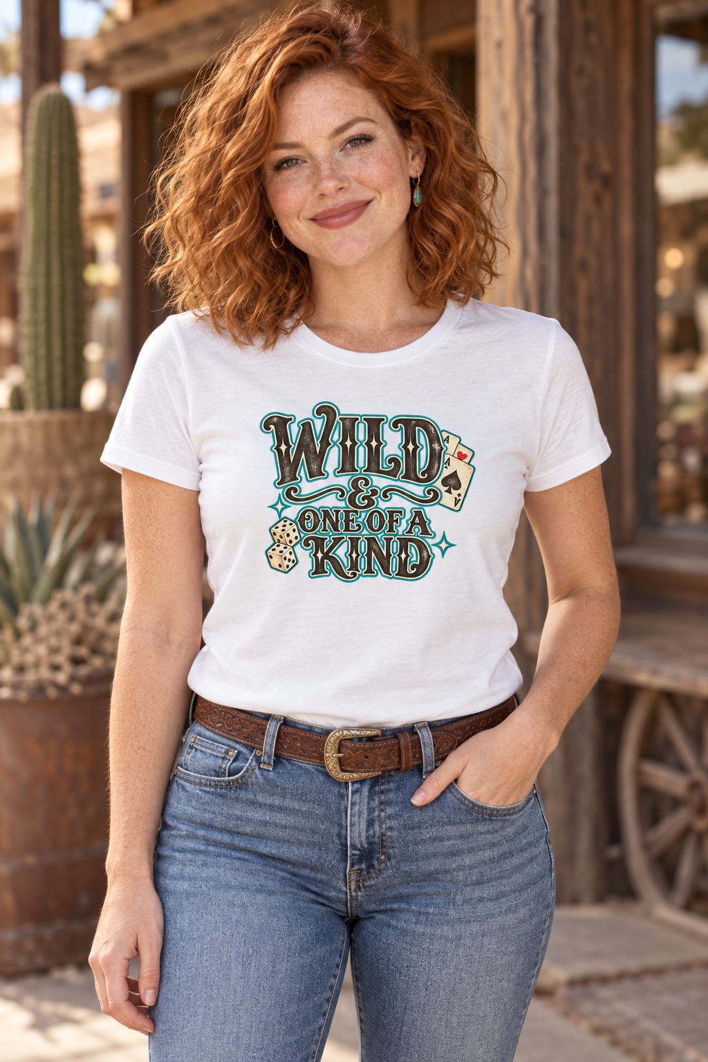 Copper-haired model wearing The Wild Card Tee with a medium-sized graphic and jeans
