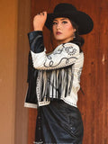 Model wearing the black and ivory embroidered fringe jacket