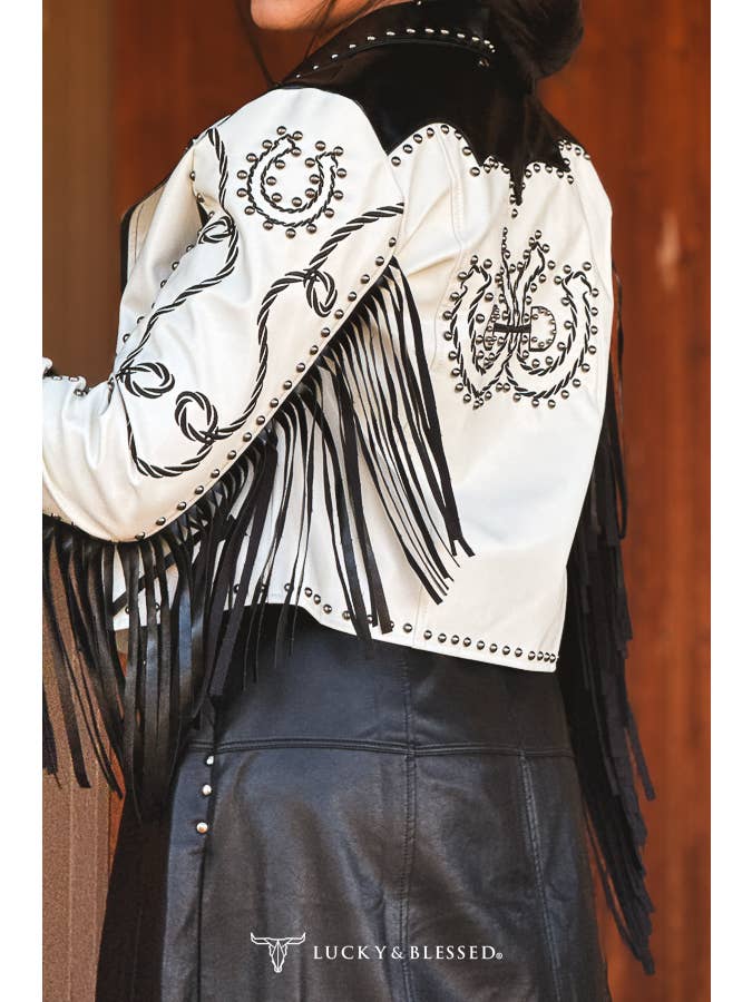 Embroidered sleeve and back detailing on the black and ivory fringe jacket