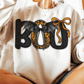 Off-white BOO crewneck sweatshirt with black and orange Halloween graphic