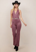 Burgundy metallic halter neck jumpsuit by Saints and Hearts; accessories shown for styling