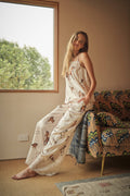 Silver grey equestrian print wide leg satin pants with lace hems, styled with a top sold separately