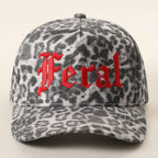 Grey leopard print trucker hat with red Feral embroidery, front view