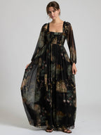 Black multi floral chiffon maxi dress with smocked bodice and sheer long sleeves