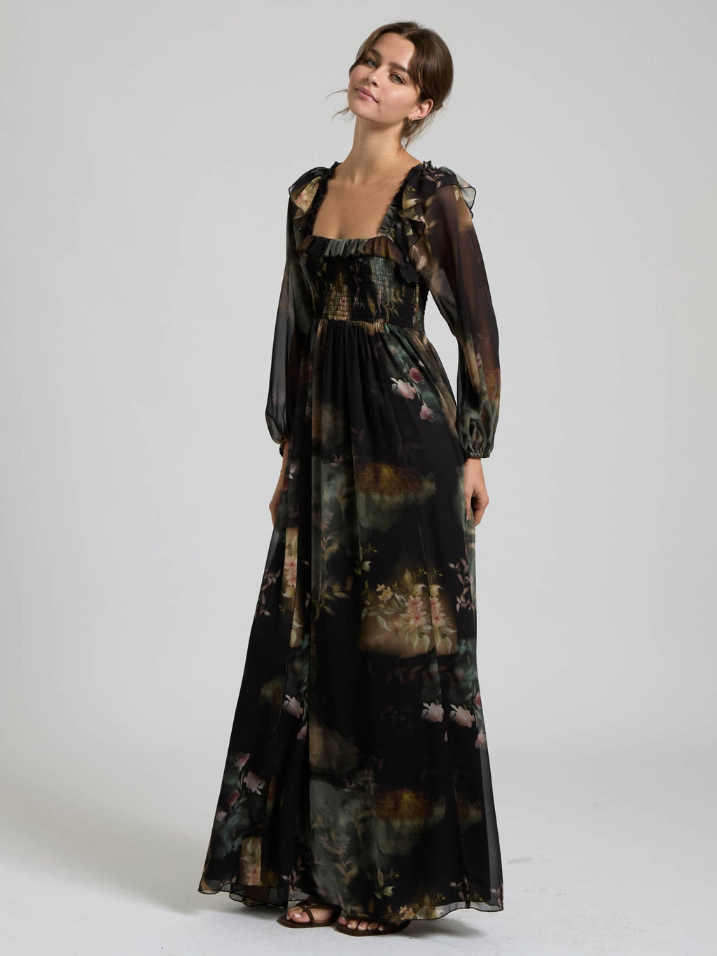 Black multi floral chiffon maxi dress with smocked bodice and sheer long sleeves