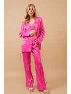 Hot pink three-piece satin set with bralette, blazer and trousers