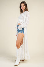 Ivory ruffled long-sleeve tie-front duster top