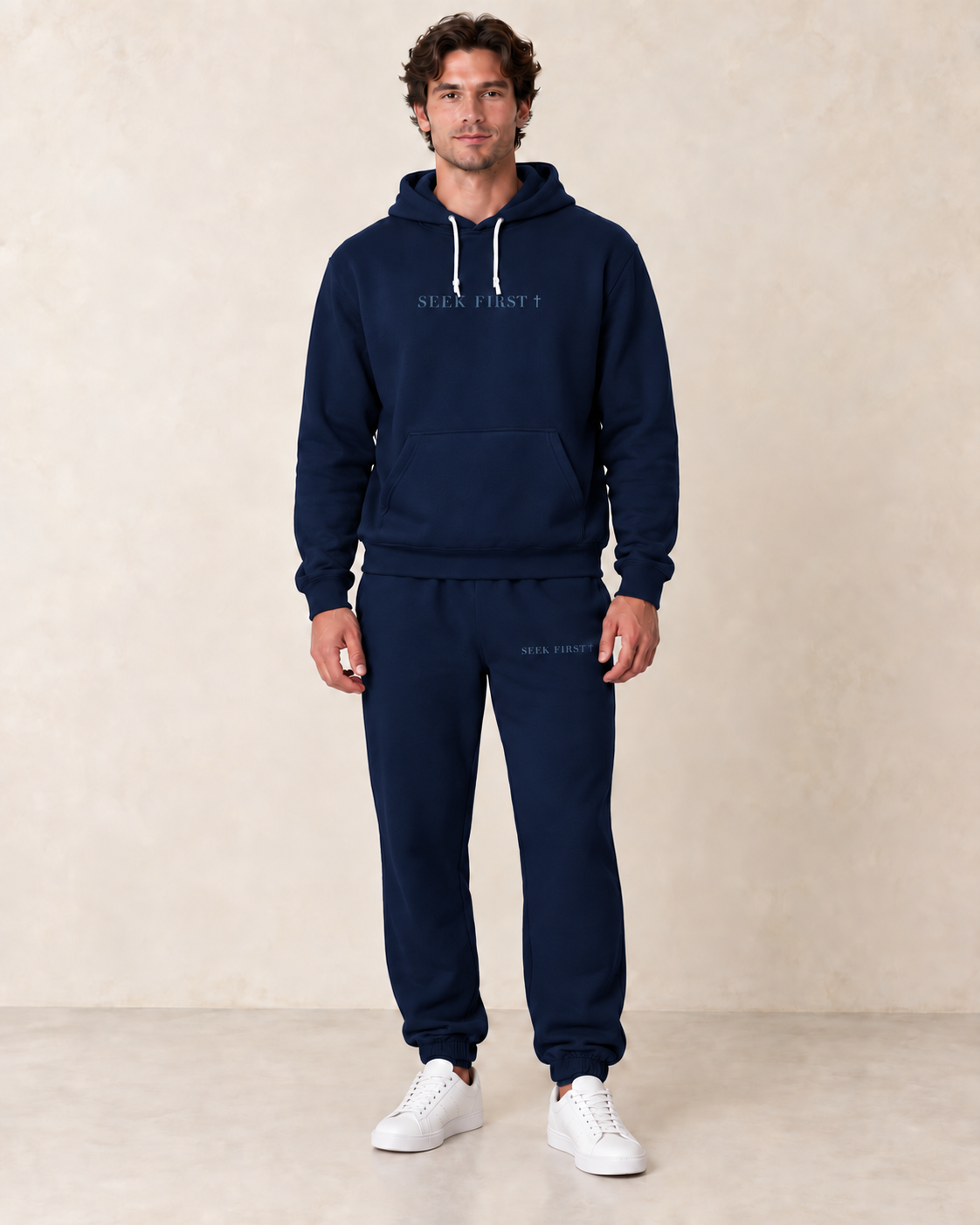 Men's Seek fleece hoodie in Navy — styled virtual mockup with white sneakers; hoodie sold separately.