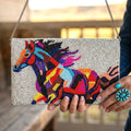 Painted Pony beaded horse clutch held with its chain strap