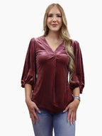 Rosalie dark mauve velvet blouse styled with black shorts