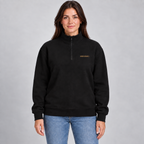 Seek 1/4 Zip Pullover in black with the new old-gold SEEK FIRST cross print — styled model mockup
