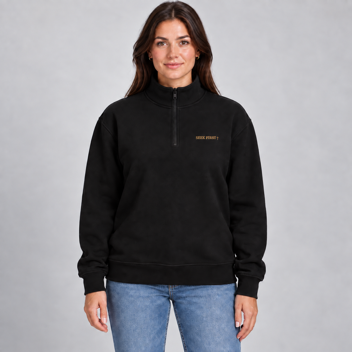 Seek 1/4 Zip Pullover in black with the new old-gold SEEK FIRST cross print — styled model mockup