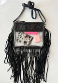 Black hand-tooled clear crossbody with fringe; contents not included