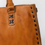 Western leather tote bag interior and strap detail