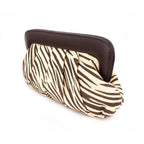 Brown and beige zebra clutch with pleated cotton body and dark brown leather-like top frame, supplier photo.
