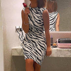 Supplier's model wearing the sleeveless white and black zebra bodycon dress